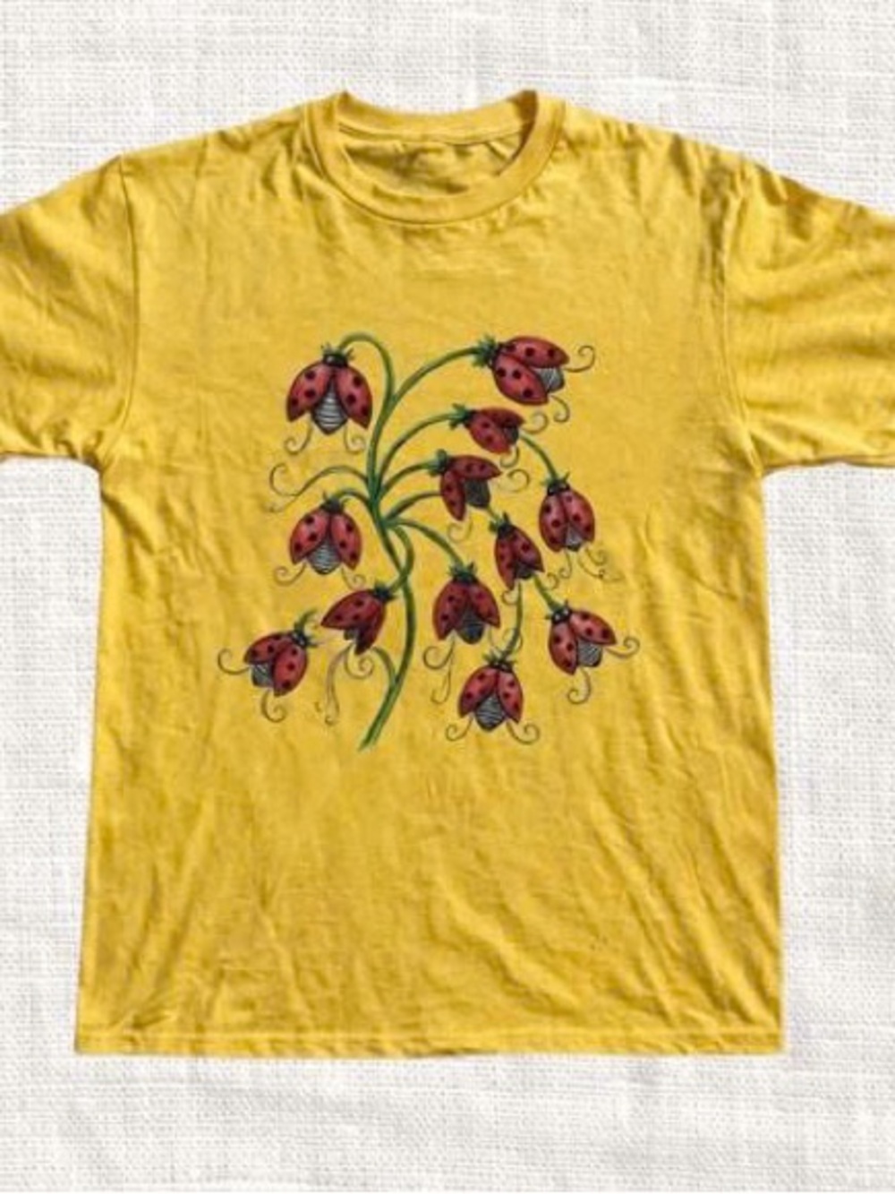 Yellow Short Sleeve Tee with Red Ladybug Floral Graphic